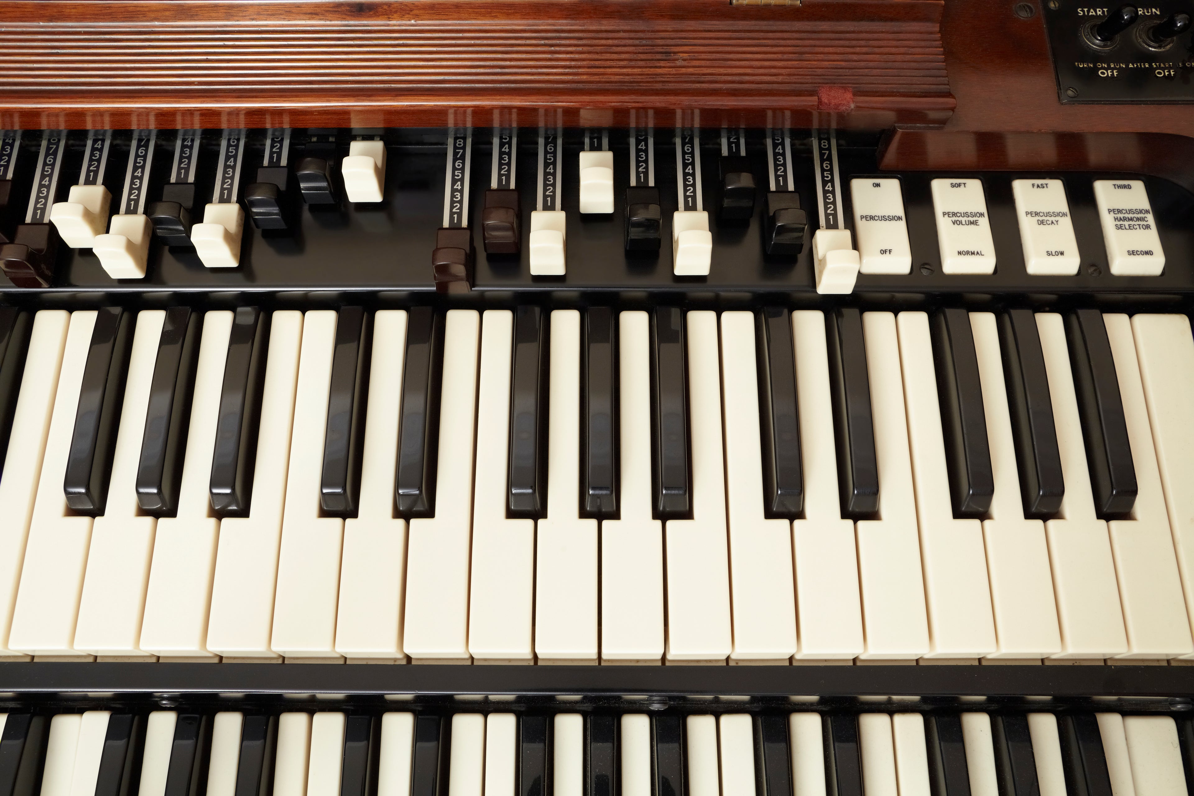 A closeup view of the waterfall keys of a Hammond B3 organ.